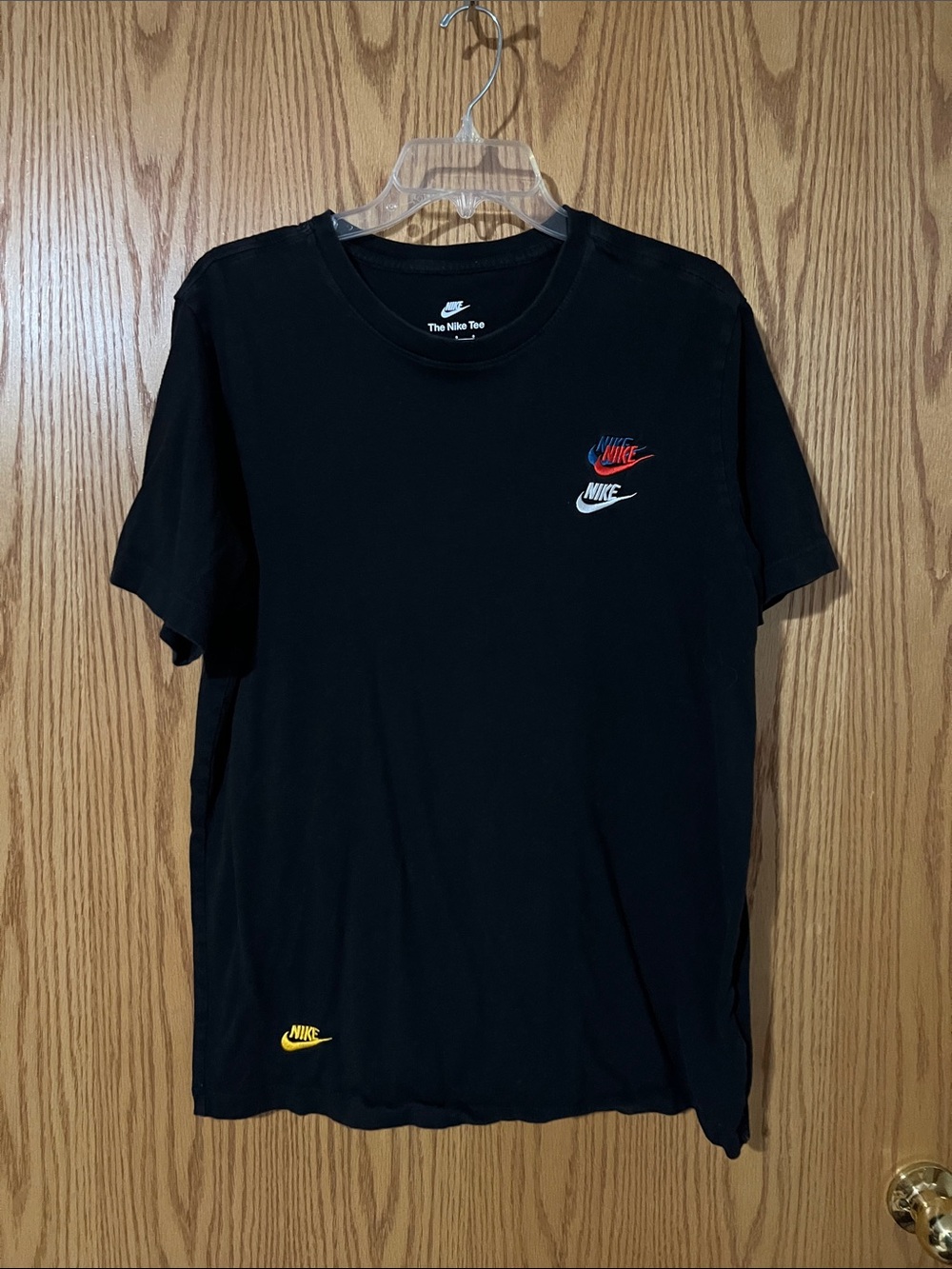 Nike Men’s Black Short Sleeve Tee with Red, White & Yellow Logos